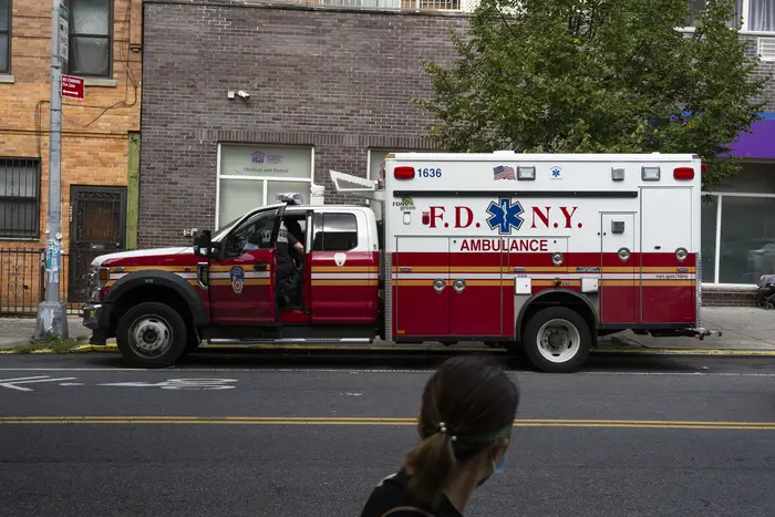 EMTs leave station 40 in Sunset Park on an emergency call.